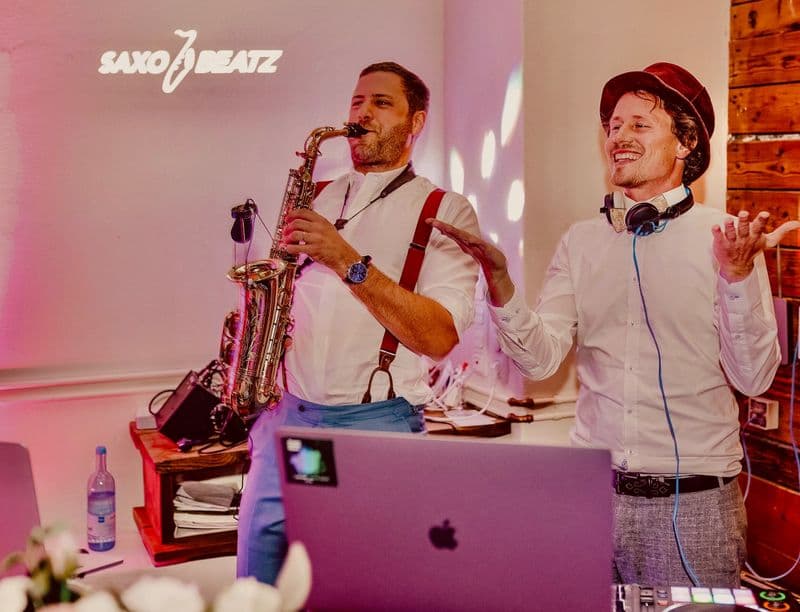 user-upload/business/work-media/1d8vgm1ks5icjlad20uhfk_saxophonist-adrian-planitz.jpeg